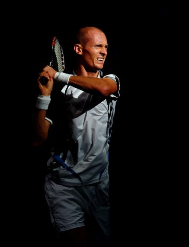 VALENCIA, SPAIN - NOVEMBER 05:  Nikolay Davydenko of Russia in action in his second round match against Juan Monaco of Argentina during the ATP 500 World Tour Valencia Open tennis tournament at the Ciudad de las Artes y las Ciencias on November 5, 2009 in Valencia, Spain.  Davydenko won the match in two sets, 6-3 and 7-5.  <br /><br /><span class="help">(Photo by Jasper Juinen/Getty Images)</span>
