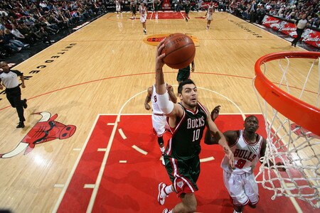 CHICAGO - NOVEMBER 03:  Carlos Delfino #10 of the Milwaukee Bucks shoots a layup against Luol Deng #9 of the Chicago Bulls on November 3, 2009 at the United Center in Chicago, Illinois.  <br /><br /><span class="help">(Photo by Gary Dineen/NBAE via Getty Images)</span>