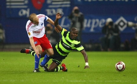 HAMBURG, GERMANY - NOVEMBER 05: (L-R) David Jarolim of HSV and Landry Nguemo of Celtic battle for the ball during the UEFA Europa League Group C match between Hamburger SV and Cletic FC at HSH Nordbank Arena on November 05, 2009 in Hamburg, Germany.  <br /><br /><span class="help">(Photo by Martin Rose/Bongarts/Getty Images)</span>