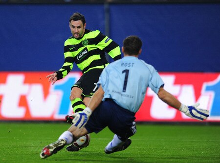 HAMBURG, GERMANY - NOVEMBER 05:  Frank Rost of Hamburg saves a shot from Scott McDonald of Celtic during the UEFA Europa League game between Hamburger SV and Glasgow Celtic on November 5, 2009 in Hamburg, Germany.  <br /><br /><span class="help">(Photo by Stuart Franklin/Bongarts/Getty Images)</span>