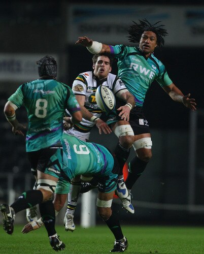 SWANSEA, WALES - NOVEMBER 05:  Ospreys forward Filo Tiatia (r) contests a high ball with John Clarke of the saints during the LV = Anglo Welsh cup match between Ospreys and Northampton Saints at the Liberty Stadium on November 5, 2009 in Swansea, Wales.  <br /><br /><span class="help">(Photo by Stu Forster/Getty Images)</span>