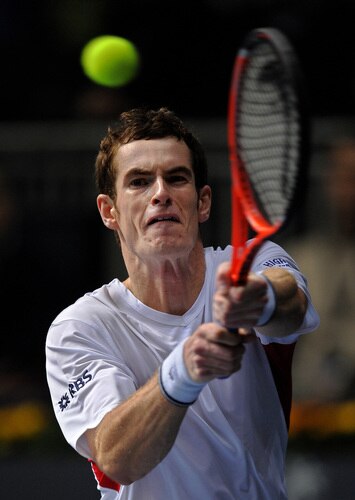 VALENCIA, SPAIN - NOVEMBER 05:  Andy Murray of Great Britain hits a double handed backhand in his second round match against Leonardo Mayer of Argentina during the ATP 500 World Tour Valencia Open tennis tournament at the Ciudad de las Artes y las Ciencias on November 5, 2009 in Valencia, Spain.  <br /><br /><span class="help">(Photo by Jasper Juinen/Getty Images)</span>