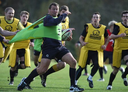 BAGSHOT, ENGLAND - NOVEMBER 04:  Steve Thompson is held back during the England training session held at Pennyhill Park on November 4, 2009 in Bagshot, England.  <br /><br /><span class="help">(Photo by David Rogers/Getty Images)</span>
