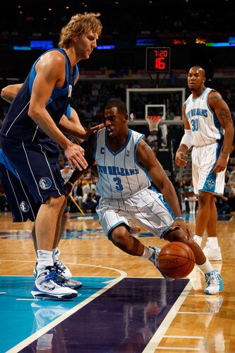 NEW ORLEANS - NOVEMBER 04:  Chris Paul #3 of the New Orleans Hornets drives the ball around Dirk Nowitzki #41 of the Dallas Mavericks at New Orleans Arena on November 4, 2009 in New Orleans, Louisiana.  <br /><br /><span class="help">(Photo by Chris Graythen/Getty Images)</span>