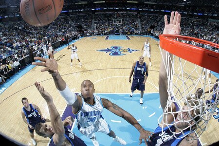 NEW ORLEANS - NOVEMBER 4: David West #30 of the New Orleans Hornets shoots over Jose Barea #11, Kris Humphries #43, Shawn Marion #0 and Dirk Nowitzki #41 of the Dallas Mavericks on November 4, 2009 at the New Orleans Arena in New Orleans, Louisiana. <br /><br /><span class="help">(Photo by Layne Murdoch/NBAE via Getty Images)</span>