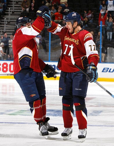 ATLANTA - NOVEMBER 05:  Pavel Kubina #77 of the Atlanta Thrashers celebrates his goal against the Columbus Blue Jackets with teammate Ron Hainsey #6 at Philips Arena on November 5, 2009 in Atlanta, Georgia.  <br /><br /><span class="help">(Photo by Kevin C. Cox/Getty Images)</span>