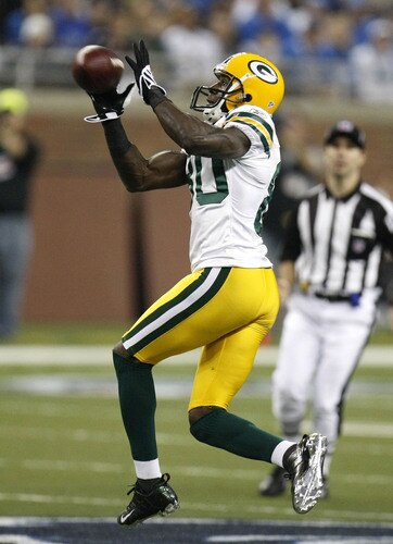 DETROIT , MI - NOVEMBER 26:  Donald Driver #80 of the Green Bay Packers catches a third quarter pass while playing the Detroit Lions on November 26, 2009 at Ford Field in Detroit, Michigan. Green Bay won the game 34-12.  <br /><br /><span class="help">(Photo by Gregory Shamus/Getty Images)</span>