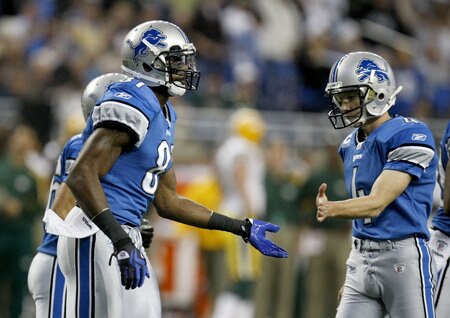 DETROIT , MI - NOVEMBER 26:  Calvin Johnson #81 of the Detroit Lions celebrates a first quarter touchdown with Jason Hanson while playing the Green Bay Packers on November 26, 2009 at Ford Field in Detroit, Michigan.  <br /><br /><span class="help">(Photo by Gregory Shamus/Getty Images)</span>