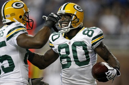 DETROIT , MI - NOVEMBER 26: Donald Driver #80 of the Green Bay Packers celebrates a third quarter touchdown with Greg Jennings while playing the Detroit Lions on November 26, 2009 at Ford Field in Detroit, Michigan. Green Bay won the game 34-12. <br /><br /><span class="help">(Photo by Gregory Shamus/Getty Images)</span>