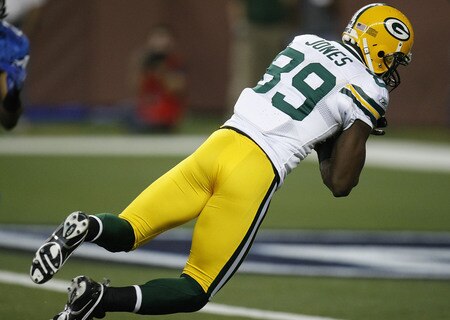 DETROIT , MI - NOVEMBER 26: James Jones #89 of the Green Bay Packers dives into the end zone for a third quarter touchdown while playing the Detroit Lions on November 26, 2009 at Ford Field in Detroit, Michigan. Green Bay won the game 34-12. <br /><br /><span class="help">(Photo by Gregory Shamus/Getty Images)</span>