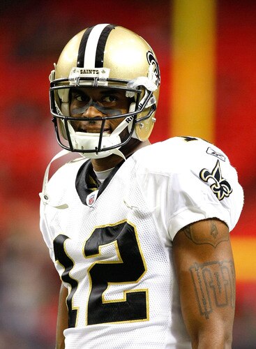 ATLANTA - DECEMBER 13:  Marques Colston #12 of the New Orleans Saints looks on during warm ups against the Atlanta Falcons at Georgia Dome on December 13, 2009 in Atlanta, Georgia.  <br /><br /><span class="help">(Photo by Kevin C. Cox/Getty Images)</span>