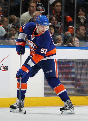 UNIONDALE, NY - DECEMBER 12:  John Tavares #91of the New York Islanders in action against the Boston Bruins during their game at the Nassau Coliseum on December 12, 2009 at the Nassau Coliseum in Uniondale, New York.  <br /><br /><span class="help">(Photo by Al Bello/Getty Images)</span>