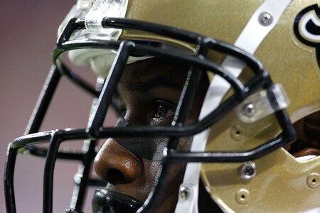 ATLANTA - DECEMBER 13:  Reggie Bush #25 of the New Orleans Saints looks on from the sidelines against the Atlanta Falcons at Georgia Dome on December 13, 2009 in Atlanta, Georgia. The Saints won 26-23.  <br /><br /><span class="help">(Photo by Kevin C. Cox/Getty Images)</span>
