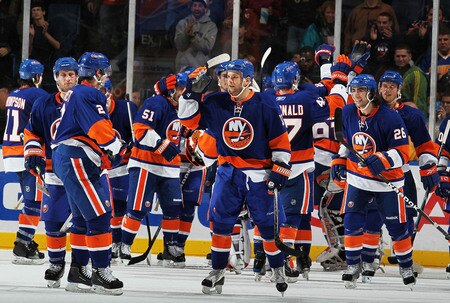 UNIONDALE, NY - DECEMBER 12:  The New York Islanders celebrate the game winning overtime goal by Frans Nielsen #51 against the Boston Bruins during their game at the Nassau Coliseum on December 12, 2009 at the Nassau Coliseum in Uniondale, New York.  <br /><br /><span class="help">(Photo by Al Bello/Getty Images)</span>