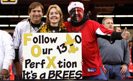 ATLANTA - DECEMBER 13:  Fans of the New Orleans Saints hold up a sign in reference to the Saint's undefeated start to the season as they stand next to a fan of the Atlanta Falcons at Georgia Dome on December 13, 2009 in Atlanta, Georgia.  <br /><br /><span class="help">(Photo by Kevin C. Cox/Getty Images)</span>