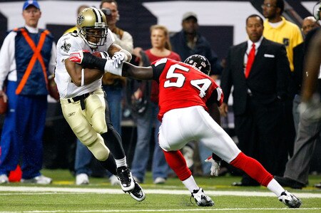 ATLANTA - DECEMBER 13:  Running back Pierre Thomas #23 of the New Orleans Saints runs with the ball in the first half against Stephen Nicholas #54 of the Atlanta Falcons at Georgia Dome on December 13, 2009 in Atlanta, Georgia.  <br /><br /><span class="help">(Photo by Kevin C. Cox/Getty Images)</span>
