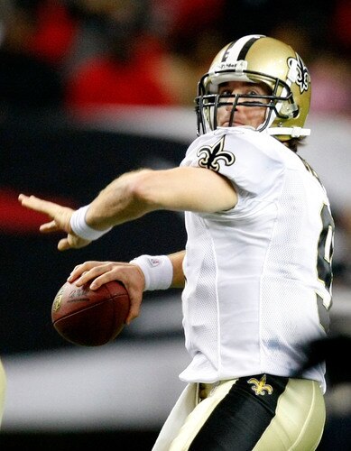 ATLANTA - DECEMBER 13:  Quarterback Drew Brees #9 of the New Orleans Saints looks to throw a pass against the Atlanta Falcons at Georgia Dome on December 13, 2009 in Atlanta, Georgia. the Saints won 26-23. <br /><br /><span class="help">(Photo by Kevin C. Cox/Getty Images)</span>