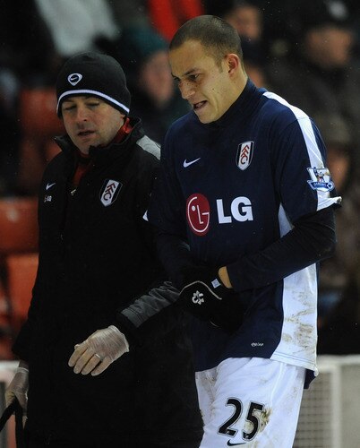 STOKE ON TRENT, ENGLAND - JANUARY 05: Bobby Zamora of Fulham leaves the field injured of Fulham battles with Rory Delap of Stoke City during the Barclays Premier League match between Stoke City and Fulham at The Britannia Stadium on January 5, 2010 in Stoke on Trent, England.  <br /><br /><span class="help">(Photo by Laurence Griffiths/Getty Images)</span>