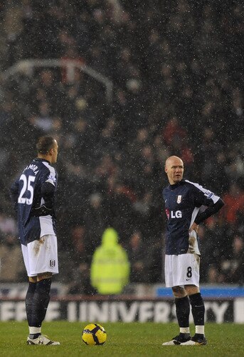 STOKE ON TRENT, ENGLAND - JANUARY 05:  Andrew Jonson and Bobby Zamora of Fulham show their dissapointment after coceding the third goal during the Barclays Premier League match between Stoke City and Fulham at The Britannia Stadium on January 5, 2010 in Stoke on Trent, England.  <br /><br /><span class="help">(Photo by Laurence Griffiths/Getty Images)</span>