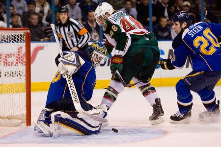 ST. LOUIS, MO - JANUARY 14: Chris Mason #50 of the St. Louis Blues makes a save against Guillaume Latendresse #48 of the Minnesota Wild at the Scottrade Center on January 14, 2010 in St. Louis, Missouri.  <br /><br /><span class="help">(Photo by Dilip Vishwanat/Getty Images)</span>