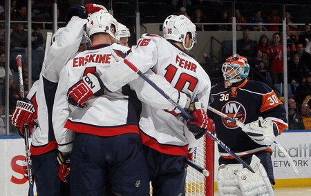 UNIONDALE, NY - JANUARY 26:  The Washington Capitals celebrate a first period goal against Dwayne Roloson #30 of the New York Islanders on January 26, 2010 at Nassau Coliseum in Uniondale, New York.  <br /><br /><span class="help">(Photo by Jim McIsaac/Getty Images)</span>