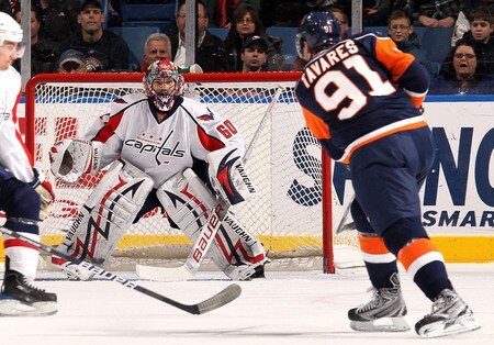 UNIONDALE, NY - JANUARY 26:  Jose Theodore #60 of the Washington Capitals makes a save against John Tavares #91 of the New York Islanders on January 26, 2010 at Nassau Coliseum in Uniondale, New York.  <br /><br /><span class="help">(Photo by Jim McIsaac/Getty Images)</span>