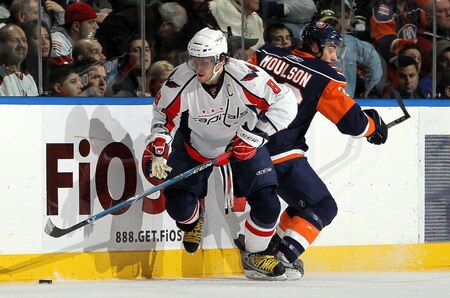 UNIONDALE, NY - JANUARY 26:  Alex Ovechkin #8 of the Washington Capitals skates against Matt Moulson #26 the New York Islanders on January 26, 2010 at Nassau Coliseum in Uniondale, New York.  <br /><br /><span class="help">(Photo by Jim McIsaac/Getty Images)</span>