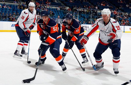 UNIONDALE, NY - JANUARY 26:  Frans Nielsen #51 of the New York Islanders skates against Jason Chimera #25 of the Washington Capitals on January 26, 2010 at Nassau Coliseum in Uniondale, New York.  <br /><br /><span class="help">(Photo by Jim McIsaac/Getty Images)</span>