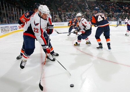 UNIONDALE, NY - JANUARY 26:  Mike Knuble #22 of the Washington Capitals plays the puck against the New York Islanders on January 26, 2010 at Nassau Coliseum in Uniondale, New York.  <br /><br /><span class="help">(Photo by Jim McIsaac/Getty Images)</span>