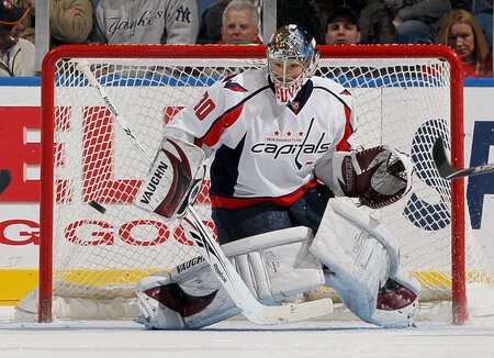 UNIONDALE, NY - JANUARY 26:  Michal Neuvirth #30 of the Washington Capitals makes a save against the New York Islanders on January 26, 2010 at Nassau Coliseum in Uniondale, New York.  <br /><br /><span class="help">(Photo by Jim McIsaac/Getty Images)</span>