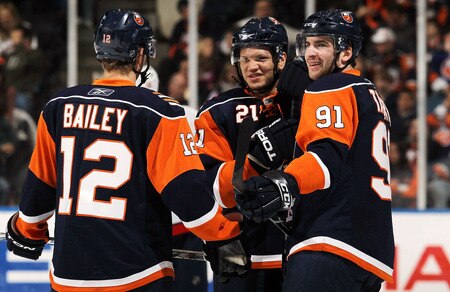 UNIONDALE, NY - JANUARY 26:  Josh Bailey #12, Kyle Okposo #21, and John Tavares #91 of the New York Islanders look on during a timeout against the Washington Capitals on January 26, 2010 at Nassau Coliseum in Uniondale, New York.  <br /><br /><span class="help">(Photo by Jim McIsaac/Getty Images)</span>