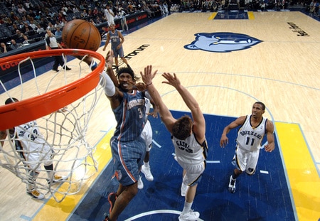 MEMPHIS, TN - FEBRUARY 26: Gerald Wallace #3 of the Charlotte Bobcats shoots over Marc Gasol #33 of the Memphis Grizzlies on February 26, 2010 at FedExForum in Memphis, Tennessee.  <br /><br /><span class="help">(Photo by Joe Murphy/NBAE via Getty Images)</span>
