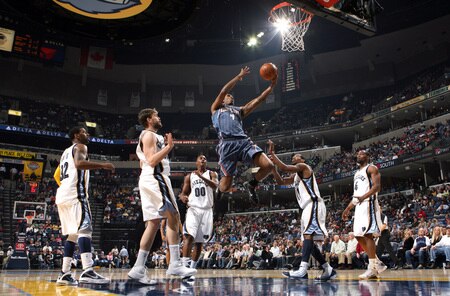 MEMPHIS, TN - FEBRUARY 26: Derrick Brown #4 of the Charlotte Bobcats shoots between Marc Gasol #33 and Mike Conley #11 of the Memphis Grizzlies on February 26, 2010 at FedExForum in Memphis, Tennessee.  <br /><br /><span class="help">(Photo by Joe Murphy/NBAE via Getty Images)</span>