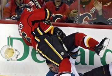 Capt_8d7f5473db57465a98fe785eb6fcbe2d_sharks_flames_hockey_jmc104_feature
