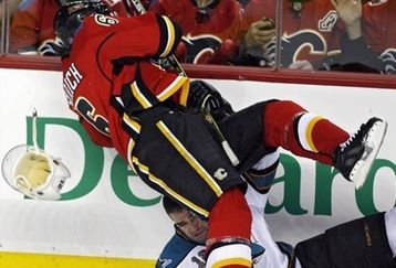 Capt_8d7f5473db57465a98fe785eb6fcbe2d_sharks_flames_hockey_jmc104_feature