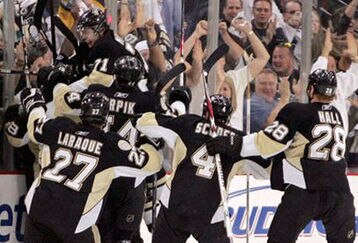 Penguins-celebrate_feature