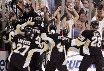 Penguins-celebrate_feature