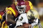 Deonte_jackson_is_stopped_by_us_crop_150x100