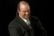 Paul_heyman_evil_grin_medium