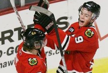 Nhl_ap_kane_toews3_300_feature
