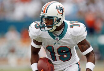 9014001_cowboys_v_dolphins_crop_340x234