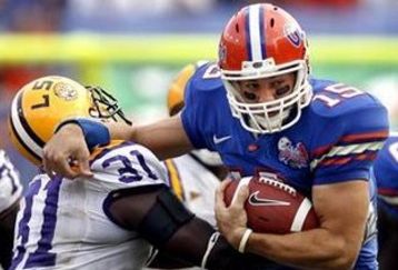 Tim_tebow_breaking_tackle_feature