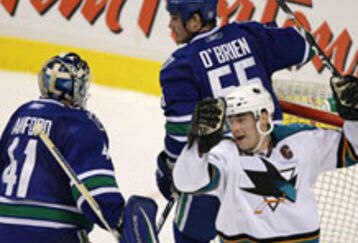 Nucks-sharks_feature