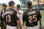 HOUSTON - JULY 12:  Barry Bonds (C-facing camera) of the Ntional League team jokes with (L-R back to camera) Derek Jeter #2, Alex Rodriguez #13 and Jason Giambi #25 before the 2004 Major League Baseball Century 21 Home Run Derby at Minute Maid Park on July 12, 2004 in Houston, Texas. (Photo by Jed Jacobsohn/Getty Images) 