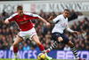 LONDON - FEBRUARY 08:  Nicklas Bendtner of Arsenal skips past Jermain Jenas of Tottenham Hotspur during the Barclays Premier League match between Tottenham Hotspur and Arsenal at White Hart Lane on February 8, 2009 in London, England.  (Photo by Mike Hewitt/Getty Images)
