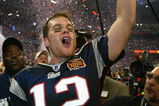 HOUSTON, TX - FEBRUARY 1:  MVP Tom Brady of the New England Patriots celebrates after defeating the Carolina Panthers 32-29 in Super Bowl XXXVIII at Reliant Stadium on February 1, 2004 in Houston, Texas. (Photo by Andy Lyons/Getty Images)