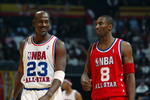 ATLANTA - FEBRUARY 9:  Michael Jordan (Washington Wizards) #23 of the Eastern Conference All-Stars talks with Kobe Bryant (Los Angeles Lakers) #8 of the Western Conference All-Stars at the 2003 NBA All-Star Game on February 9, 2003 at Philips Arena in Atlanta, Georgia.  NOTE TO USER:  User expressly acknowledges and agrees that, by downloading and or using this photograph, user is consenting to the terms and conditions of the Getty Images license agreement. (Photo by Jamie Squire/Getty Images)