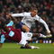 LONDON - FEBRUARY 08:  Nemanja Vidic of Manchester United challenges Carlton Cole of West Ham United  during the Barclays Premier League match between West Ham United and Manchester United at Upton Park on February 8, 2009 in London, England.  (Photo by Ryan Pierse/Getty Images)