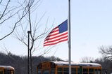 Delacey-flag-at-half-staff-7096_more_feature