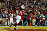 TAMPA, FL - FEBRUARY 01:  Larry Fitzgerald #11 of the Arizona Cardinals celebrates after scoring a touchdown in the fourth quarter against the Pittsburgh Steelers during Super Bowl XLIII on February 1, 2009 at Raymond James Stadium in Tampa, Florida.  (Photo by Jamie Squire/Getty Images)